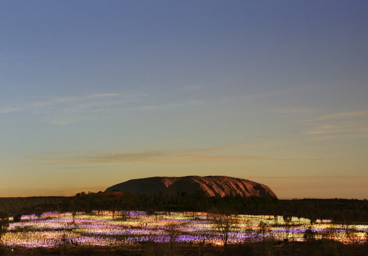 Bruce Munro's Field of Light installation at the base of Uluru